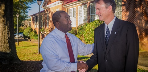 two men shaking hands