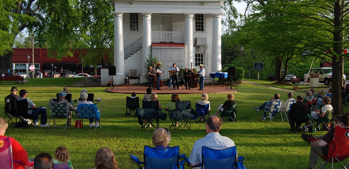 people enjoying live music outdoors