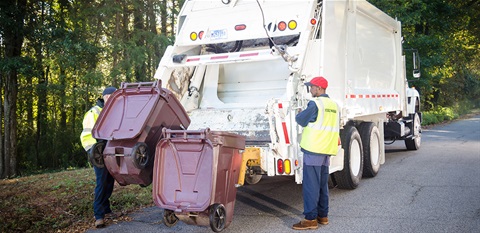 Garbage and recycling employees at work